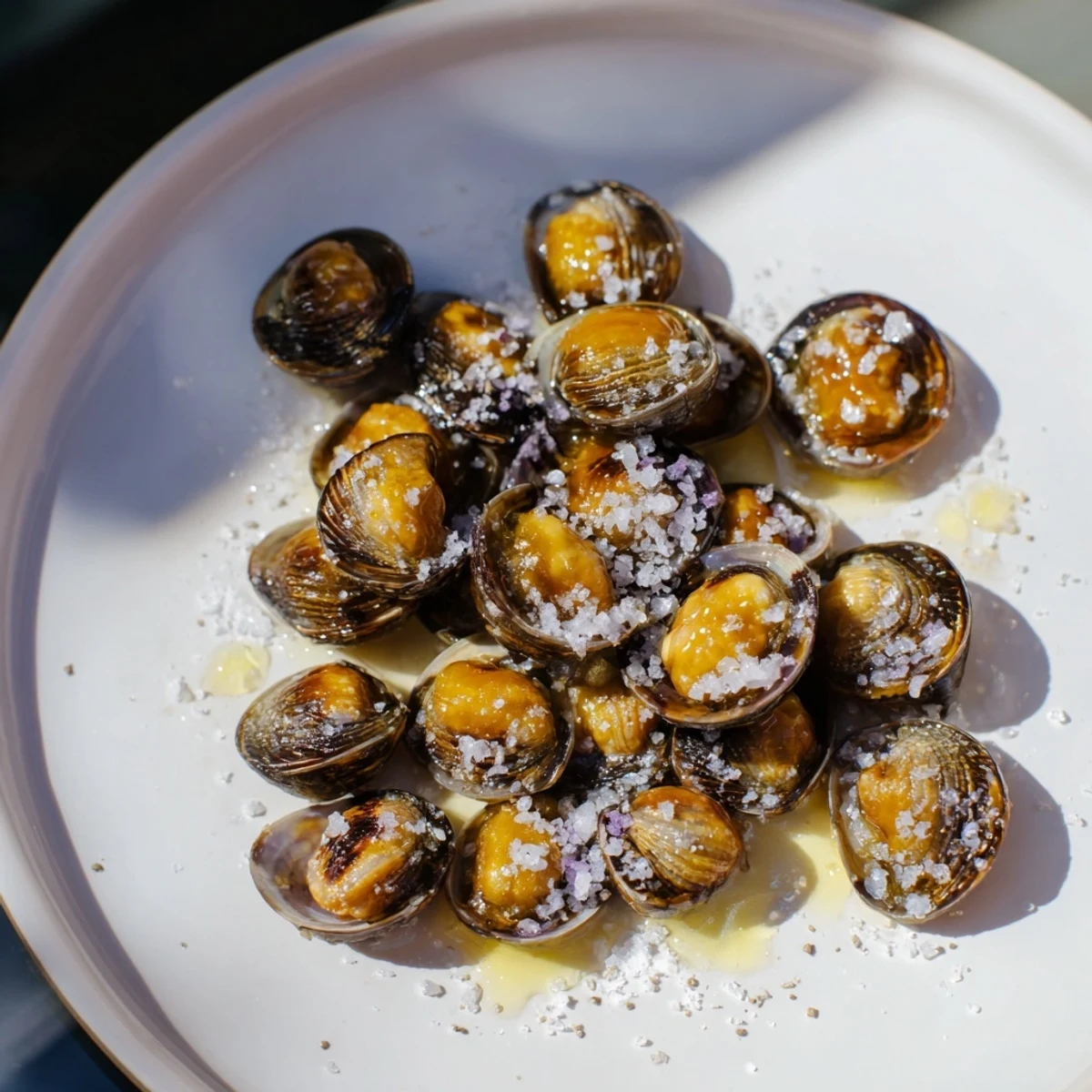 Warm, toasted Simple Garlic-Honey Roasted Pecans—the recipe's finished product, perfect for snacking or holiday gatherings.