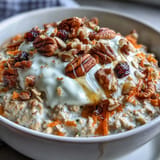 Delicious Carrot Cake Overnight Oats layered with shredded carrot and spices, ready to eat.