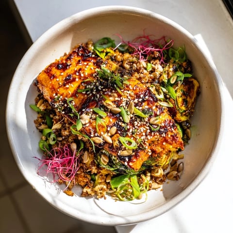 Golden-brown, crispy Honey-Soy Glazed Brussels Sprouts glistening with a sweet, savory glaze, ready to serve.