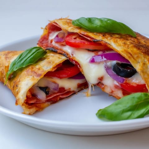 A close-up view of a golden, crispy Tortilla Pizza Wrap with melted mozzarella, pepperoni, and colorful bell peppers served hot.  