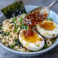 Rich Homemade Miso Ramen bowl with melting egg and savory broth, perfect for dinner.